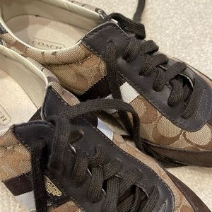 One pair of coach athletic shoes